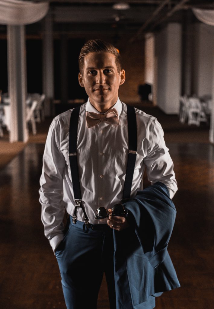 Man in bowtie and suspenders.